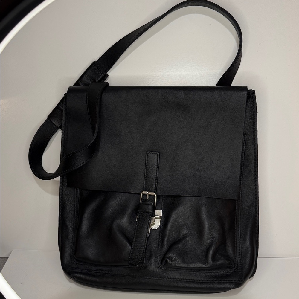 ROOTS Leather Convertible Crossbody and Backpack.